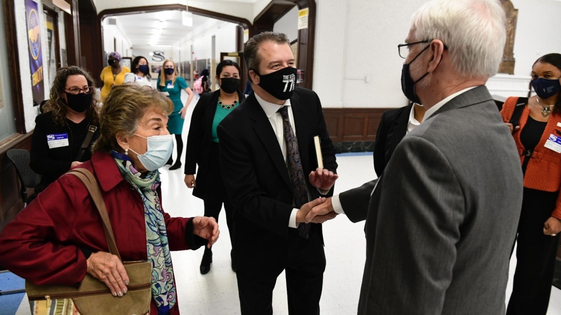 Schakowsky greets CPS CEO Pedro Martinez and University of Illinois System President Dr. Tim Killeen